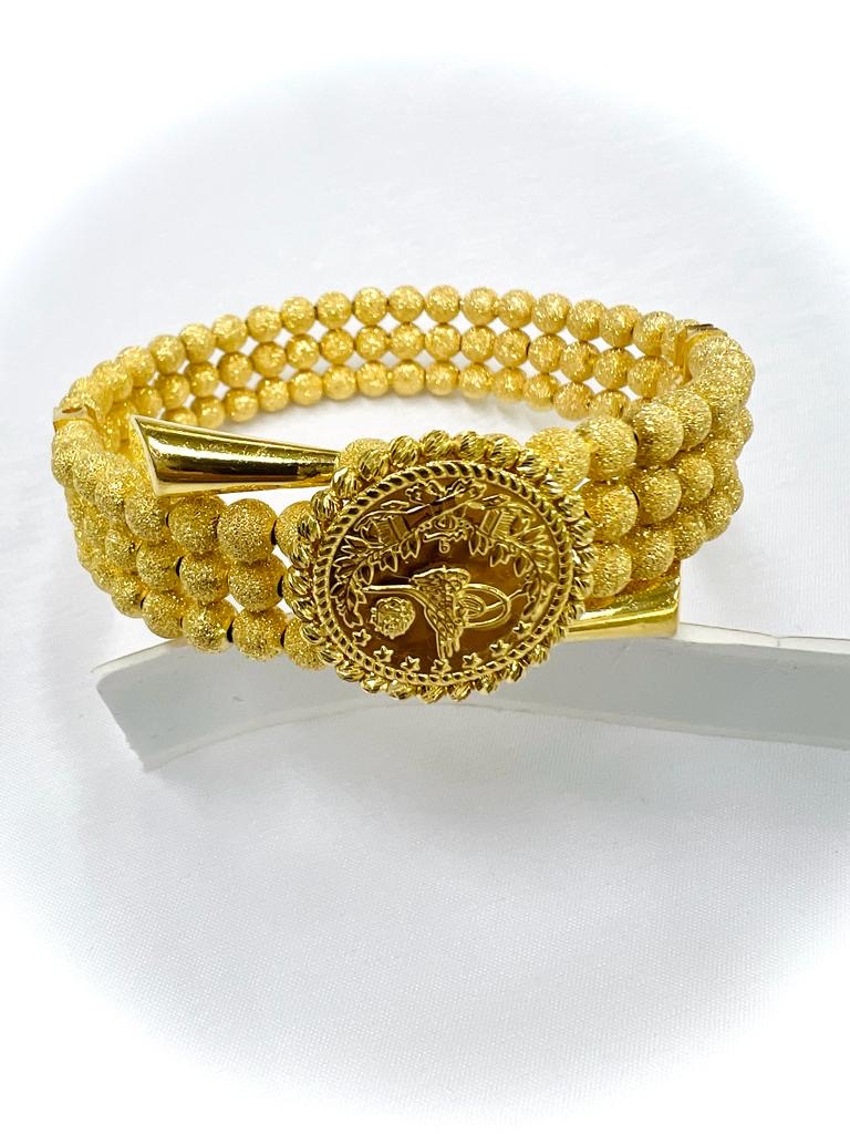 21k Gold - Weight: 64.10 grams