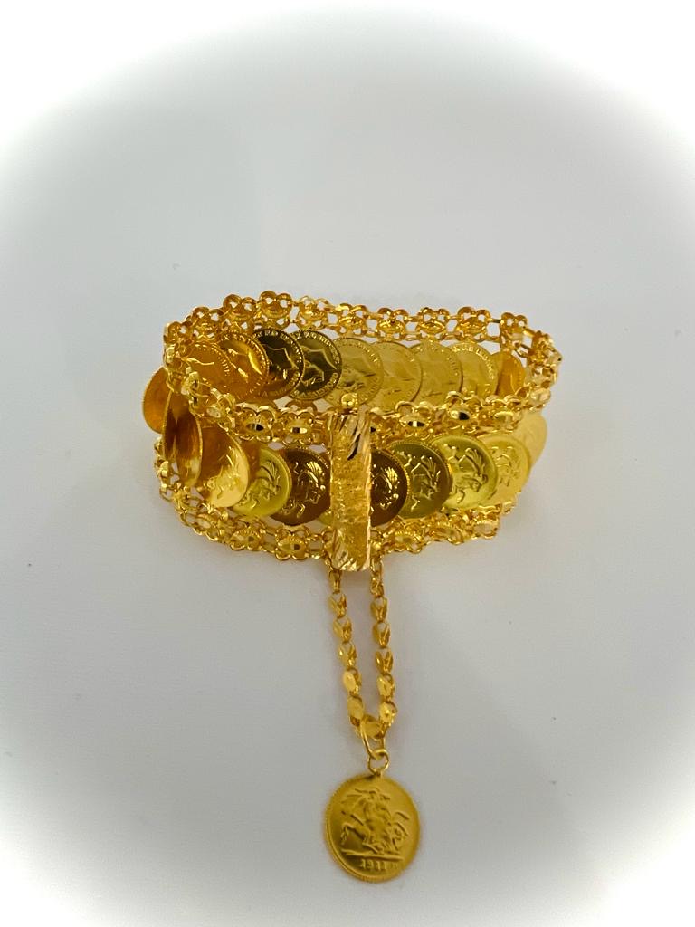 21k Gold - Weight: 70.30 grams