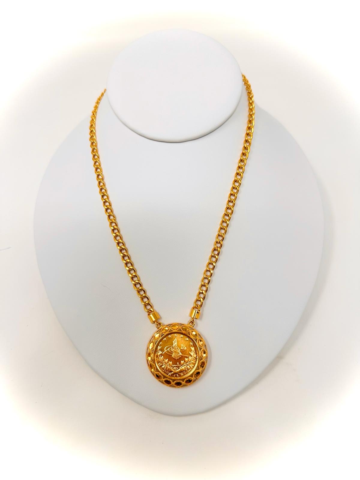 21k Gold Weight: 23.30 grams